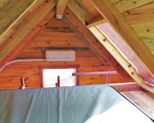 king size bed in the loft